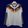 Germany Home White Long Sleeve Jersey 2627 Fans Version1 - KFCool – Football Jerseys & Soccer Kits Store Germany Home White Long Sleeve 26/27 Fans — Front View | 2026 World Cup Fan Edition