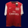 front view of 125th anniversary retro football jersey with commemorative detailing (11/12).