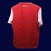 back view of 125th anniversary retro football jersey (11/12) showing commemorative back panel and number zone.