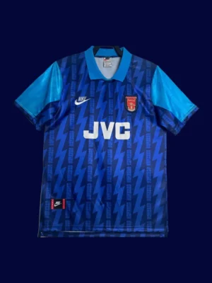 front view of blue away retro football jersey (94/95) with classic styling and vintage collar.
