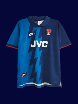 front view of blue away retro football jersey (95/96) with retro collar and stripe accents.