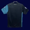 back view of away retro soccer jersey (11/12) showing plain back and number-ready surface.