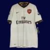 front view of white away retro football jersey (07/08) with subtle stripes and fitted cut.