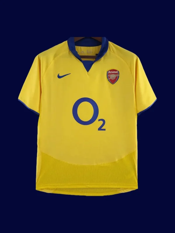 front view of yellow away retro football jersey (03/05) with bold retro accents and crew neck.