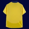 back view of yellow away retro football jersey (03/05) showing plain back ready for numbers.