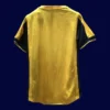 back view of yellow away retro football jersey (2000) showing smooth back panel for numbers.