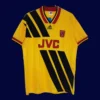 front view of yellow away retro football jersey (93/94) with traditional cut and bold trim.