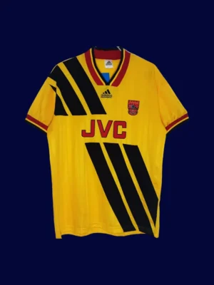 front view of yellow away retro football jersey (93/94) with traditional cut and bold trim.