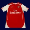front view of red home retro football jersey (14/15) with modern tailoring and retro touches.