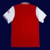 back view of red home retro football jersey (19/20) showing reinforced back and number area.