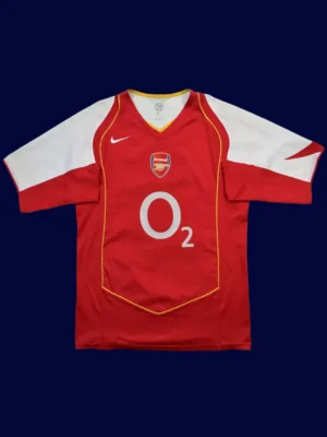 front view of red home retro football jersey with classic collar (04/05) and vintage styling.