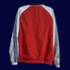 back view of reversible windbreaker showing reverse colorway and tidy seams (24/25).