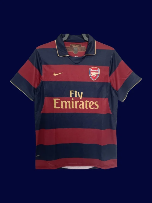 front view of third retro football jersey (07/08) with distinctive color blocks and retro collar.