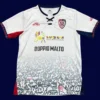 Cagliari Away Jersey 25/26 Fans Version front with away design and club badge.