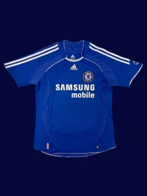 front view of Chelsea home blue retro jersey (06/07) with classic collar.
