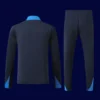 back view of Chelsea tracksuit (2025) showing smooth back panel and ergonomic seam design.