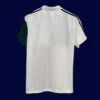 back view of Liverpool away green retro jersey (95/96) showing stitched back panel.