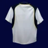 back view of away Super Cup Final retro jersey (01/02) showing number-ready back panel.