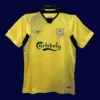 front view of Liverpool away yellow retro jersey (04/05) with vintage collar.