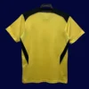 back view of Liverpool away yellow retro jersey (04/05) showing number-ready back panel.
