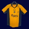 front view of Liverpool FA Cup Final retro jersey (00/01) in red with classic trims.