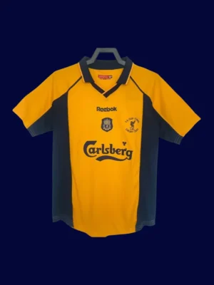 front view of Liverpool FA Cup Final retro jersey (00/01) in red with classic trims.