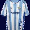 Malaga Bilbao Home Jersey 25/26 Fans Version front with combined club crest and design.