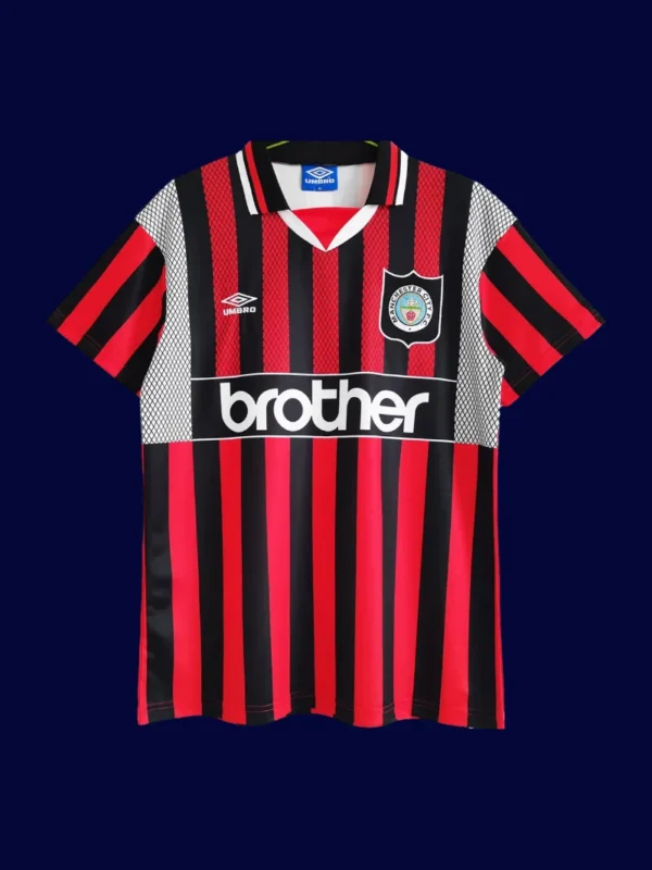 front view of Manchester City away retro jersey (94/96) in sky blue with vintage trim.