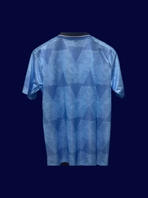 back view of home blue retro shirt (1989) showing stitched back panel.