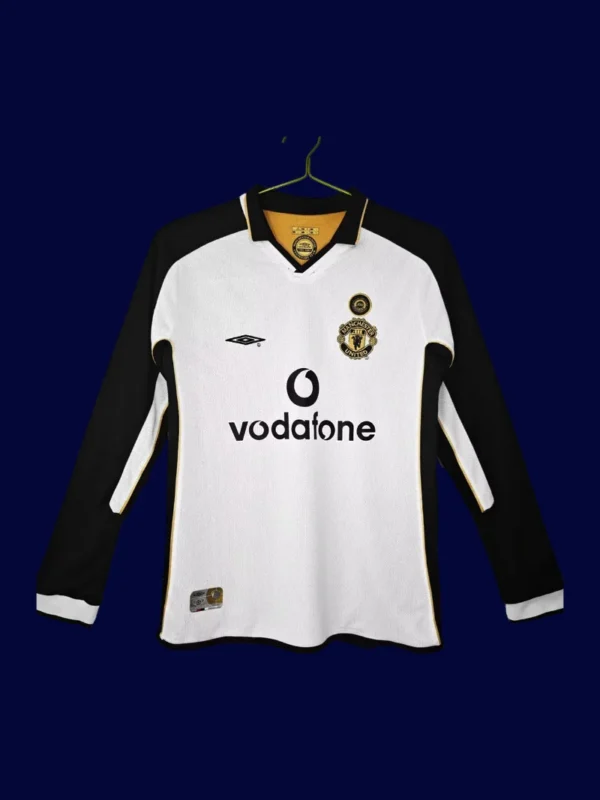 front view of Manchester United 100th Centenary long sleeve retro jersey (01/02) in red.