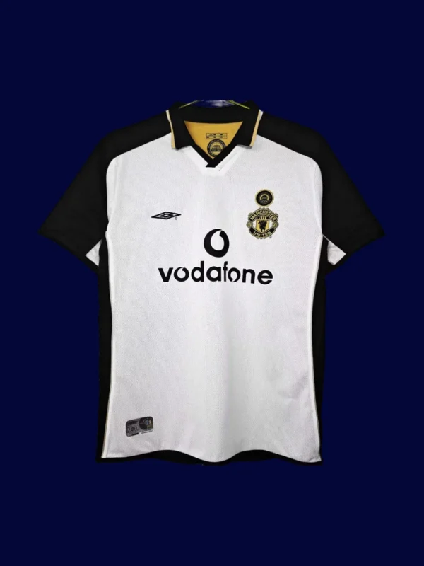 front view of Manchester United 100th Centenary retro jersey (01/02) in red with commemorative detailing.