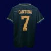 back view of away black retro jersey (1994) showing stitched back for number placement.