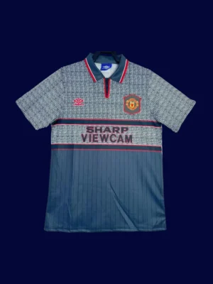 front view of Manchester United away black retro jersey (94/96) with long sleeves.
