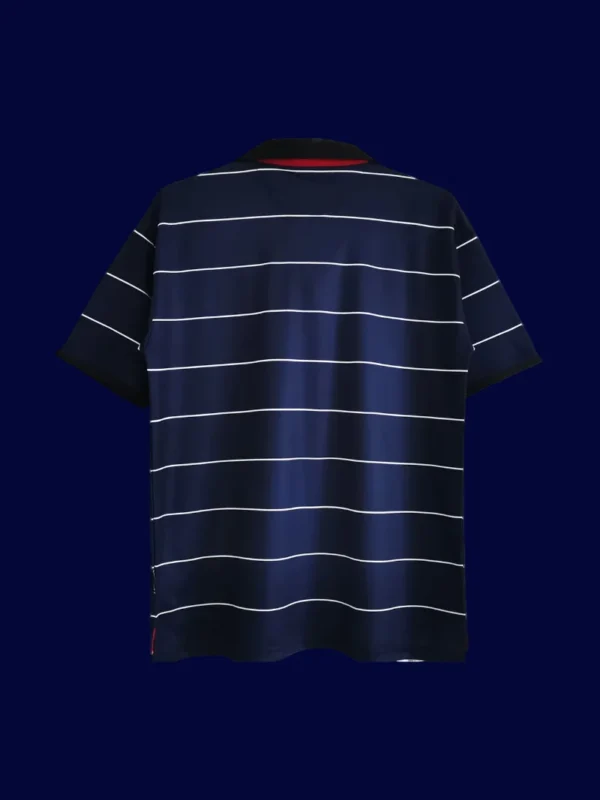back view of away retro soccer jersey (99/00) showing stitched back and number area.