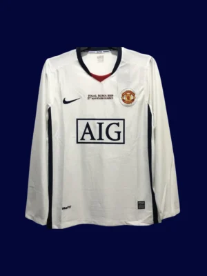 front view of Manchester United away UCL retro long sleeve jersey (08/09) with blue base and vintage trims.
