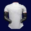 back view of away white player-fit retro jersey (13/14) showing reinforced number area.