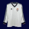 front view of Manchester United FA Cup Final long sleeve retro jersey (1983) in red.