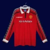front view of Manchester United home long sleeve retro jersey (98/99) in red.