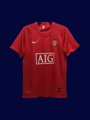 front view of Manchester United home red retro jersey (07/08) with classic V-neck and subtle trims.