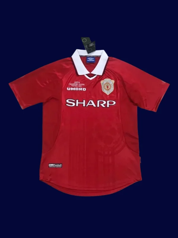 front view of Manchester United home red retro jersey (1999) with traditional collar.