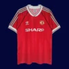 front view of Manchester United home red retro jersey (90/92) with classic collar.