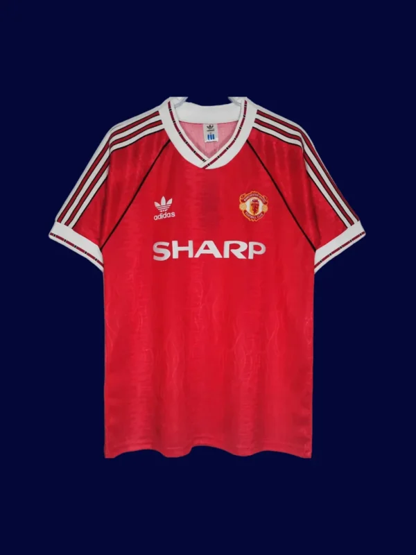 front view of Manchester United home red retro jersey (90/92) with classic collar.