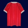 back view of home red retro jersey (90/92) showing stitched back and number-ready area.