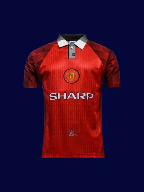 front view of Manchester United home retro jersey (96/97) in red with classic trims.