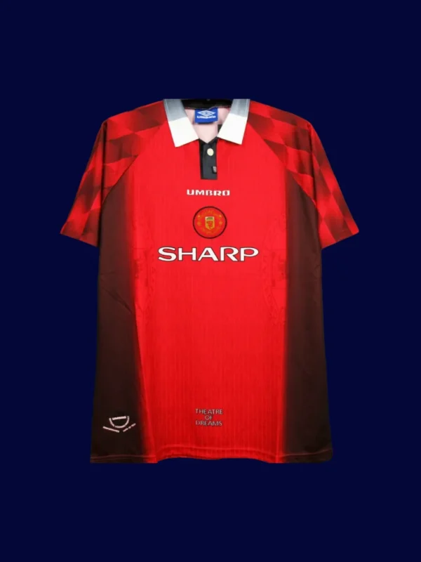 front view of Manchester United home retro jersey (96/97) in red with classic trims.