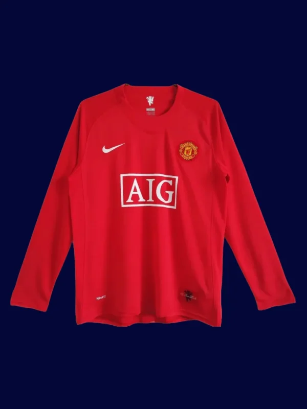 front view of Manchester United home retro long sleeve jersey (07/08) in red with classic cuffs.