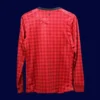 back view of long sleeve player-fit home retro jersey (12/13) showing reinforced number area.