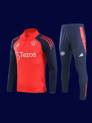 front view of red Manchester United tracksuit (2025) with zip-up jacket and tapered fit.