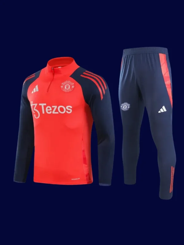 front view of red Manchester United tracksuit (2025) with zip-up jacket and tapered fit.