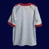 back view of Winners Cup Final retro jersey (1991) showing stitched back and number area.